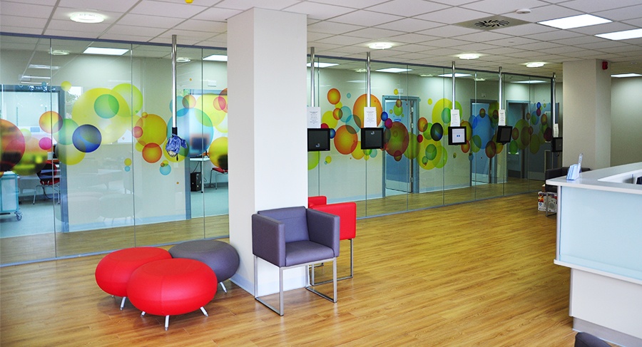 Colourful Branded NHS Reception Area